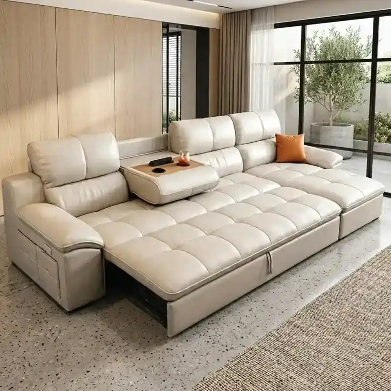  convertible sofa bed in beige leatherette with centre console, cup holders, USB port, and pull-out bed function