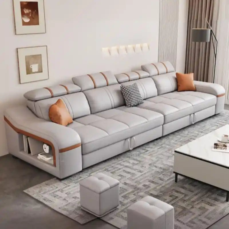 grey sofa cam bed shown in living room view with side shelf, wide sleeper surface, and couch bed comfort