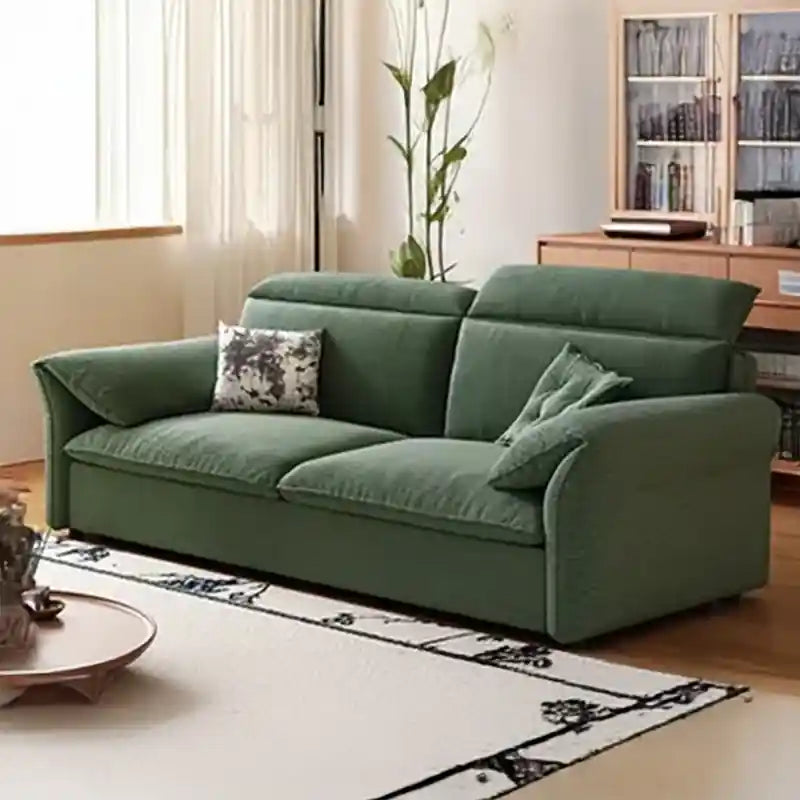 green sofa cum bed with pull-out bed function, medium-soft cushions, wide armrests, and everyday couch bed comfort
