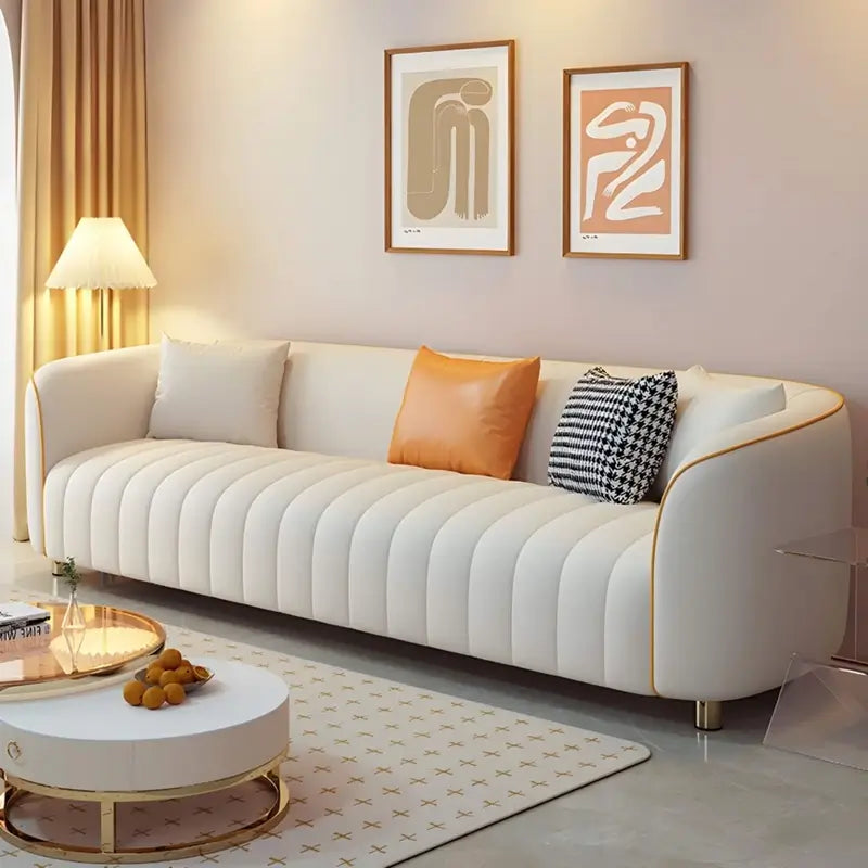 Ivory sofa set with gold-finished metal legs, designer sofa style, and elegant seating for modern interiors