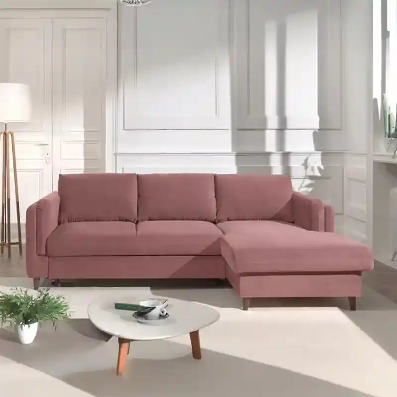  pink sofa cumm bed with compact chaise layout, wide padded arms, and modern sofa bed design