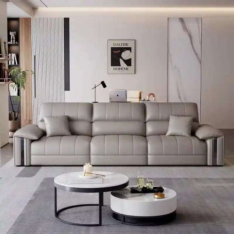 Light grey sofa cumm bed with pull-out sofa bed function, pillow-top armrests, vertical stitched panels, and premium couch bed styling