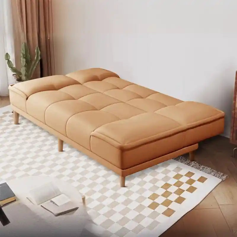 blue modern sofa bed with tufted cushions and wooden legs