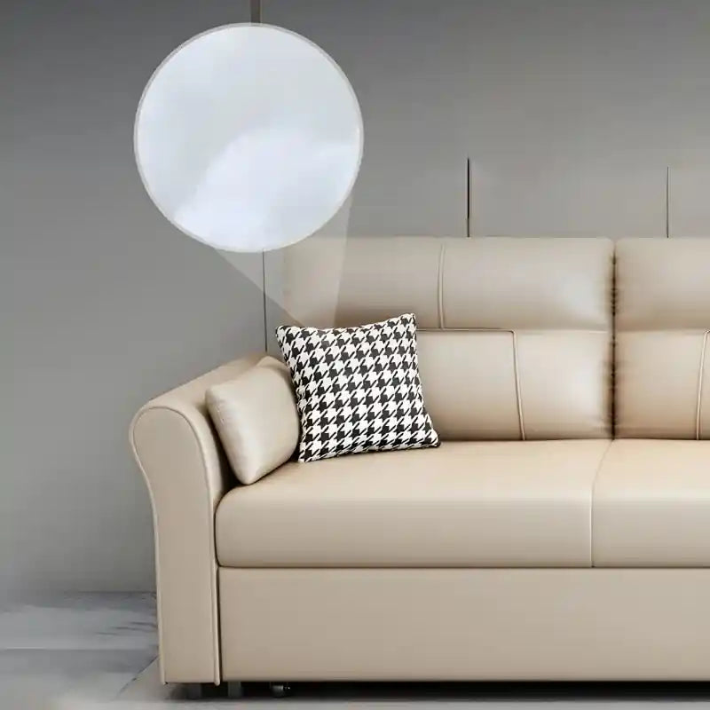 Close-up of L cream sofa bed showing padded armrest, back cushion, smooth upholstery, and comfortable sofa bed seating