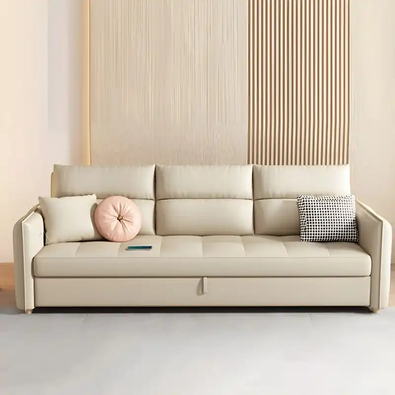  couch bed with padded arms, soft back cushions, and tapered wooden legs