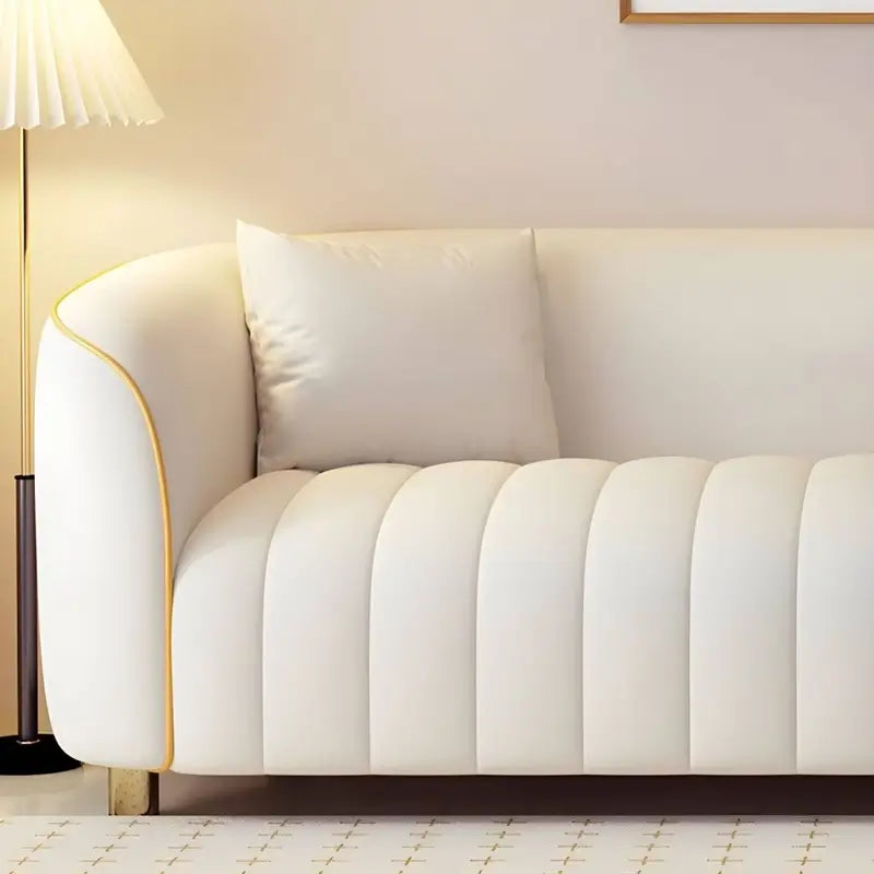 Premium sofa for home with plush seating, gold piping detail, ivory fabric, and elegant lounge sofa comfort