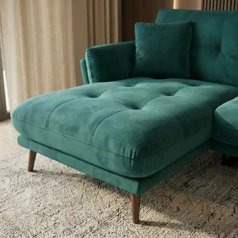 Leather sofa armrest detail with tufted cushions, padded side arms, wooden leg, and modern couch styling
