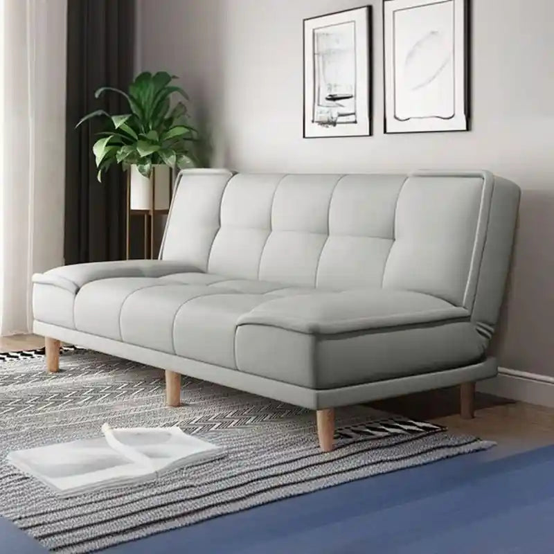 brown click-clack sofa bed converted into couch bed for sleeping