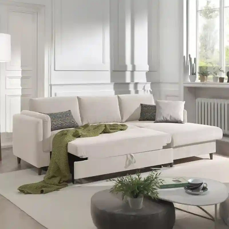 white pull-out sofa bed showing open under-chaise storage for blankets and daily essentials