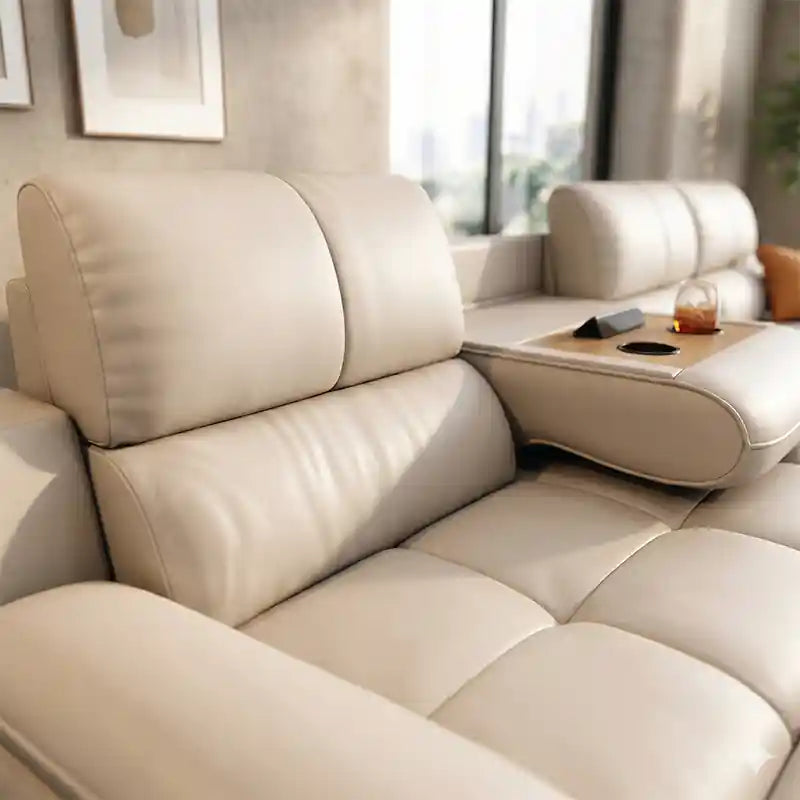 Close-up of  sofa bed with console showing beige tufted cushion detail