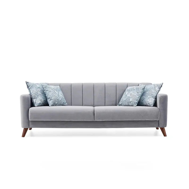 Gray armchair with a patterned pillow on a white background
