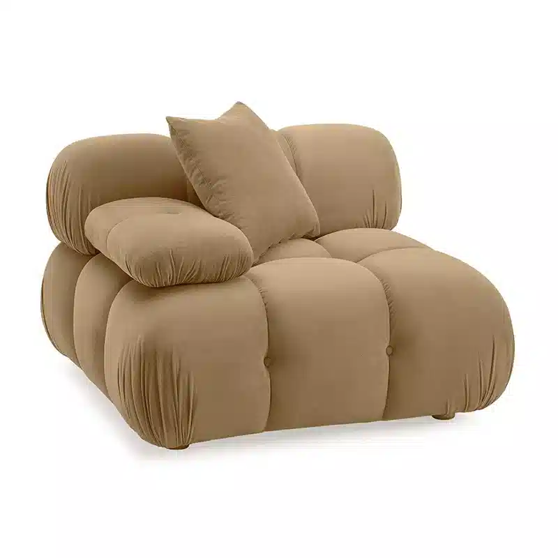 Beige sofa with a pillow on a white background
