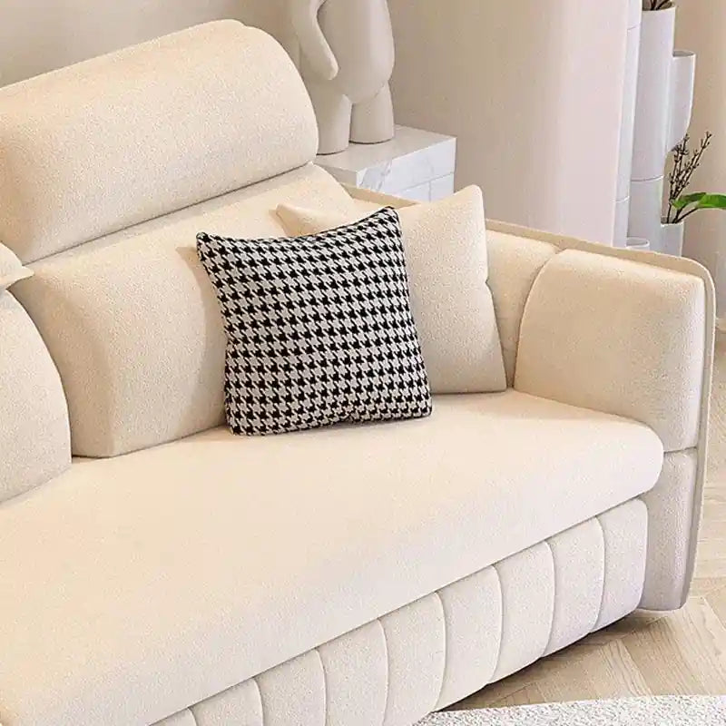 cream modern sofa bed with chaise lounge, USB port, storage ottoman, and wide seating layout