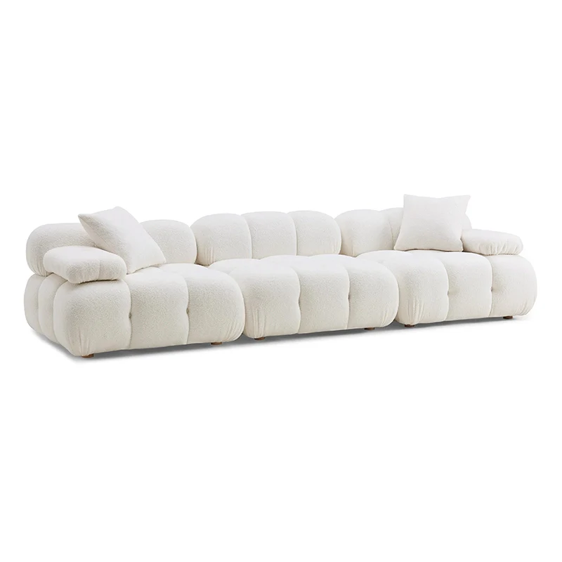 The deep tufted velvet upholstery adds richness while rounded bolsters and soft edges promote relaxed lounging.