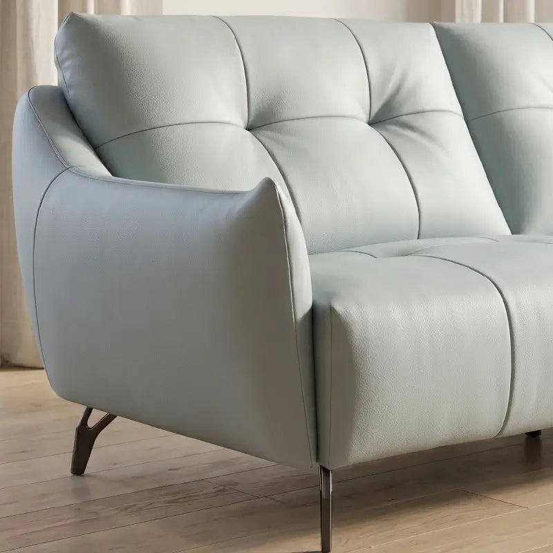 Flared-arm corner layout with l shape couch ice blue cushioned seating