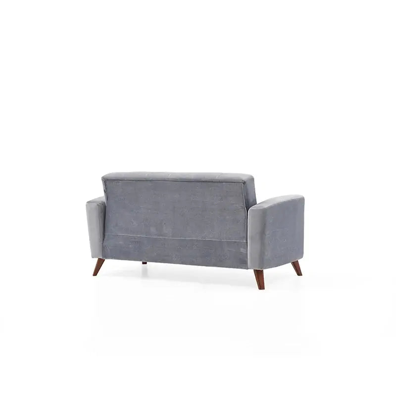 Yellow sofa with decorative pillows on a white background