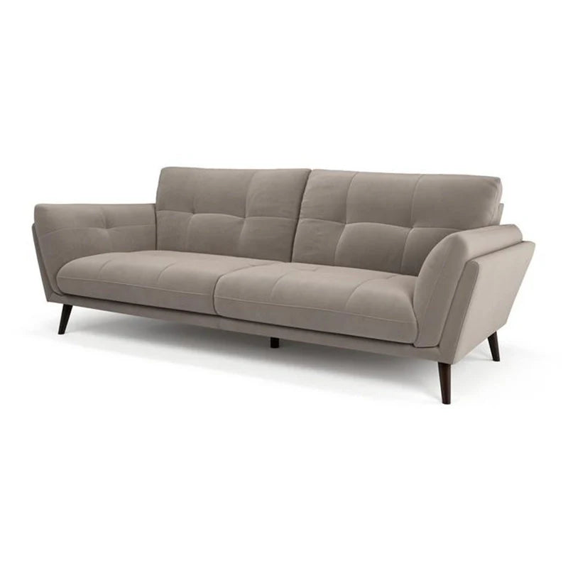A luxury velvet sofa with refined profile and utility, it’s a modern solution for those seeking a stylish, modular fabric couch.
