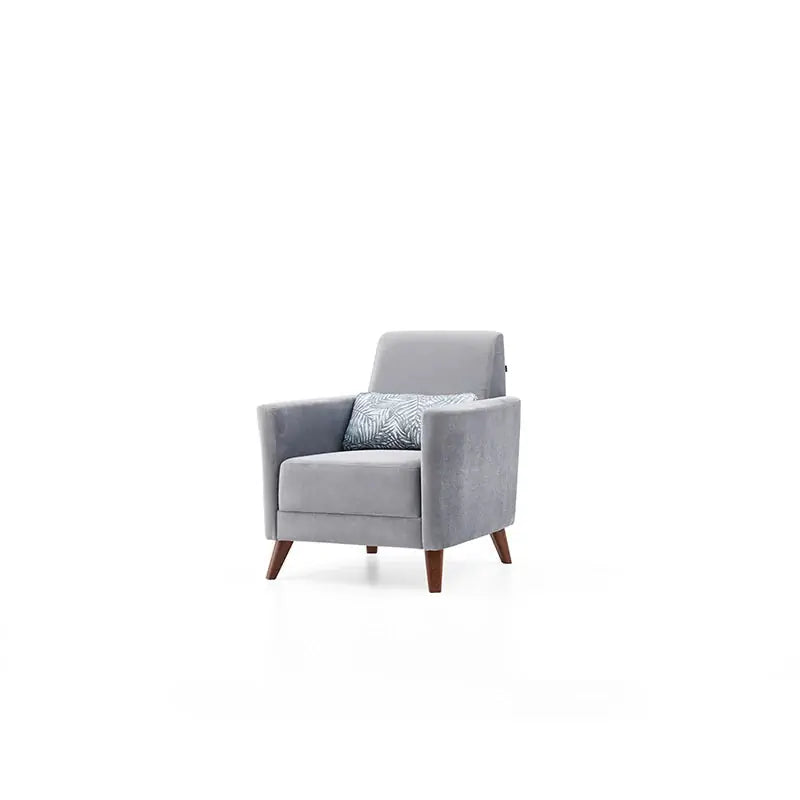 Upholstered in soft grey velvet-touch fabric, each sofa and couch piece features vertical channel tufting and tapered walnut-finish wooden legs for a sleek, elevated silhouette. 