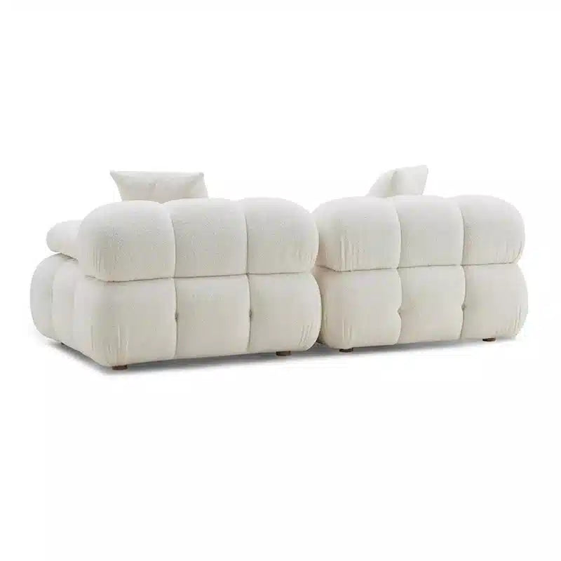 White sofa with a modern design on a white background