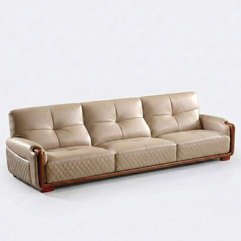 This sofa set features a warm beige/cream upholstery that gives a soft, inviting and premium look