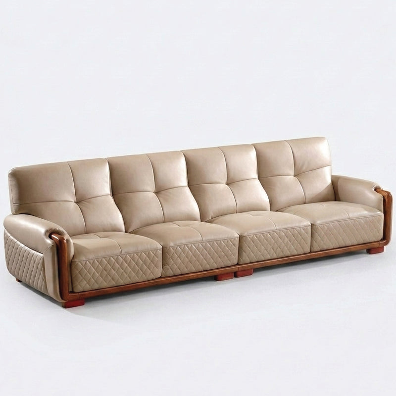 The design is enhanced with square panel tufting on the backrest and elegant