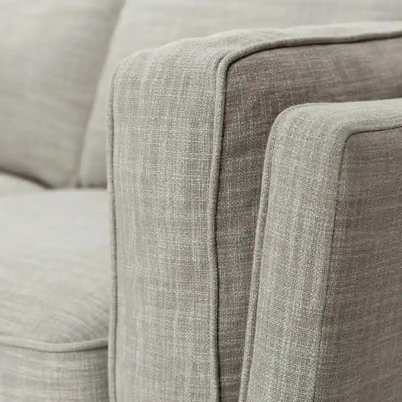extending along the bottom and supported by sleek, tapered wooden legs