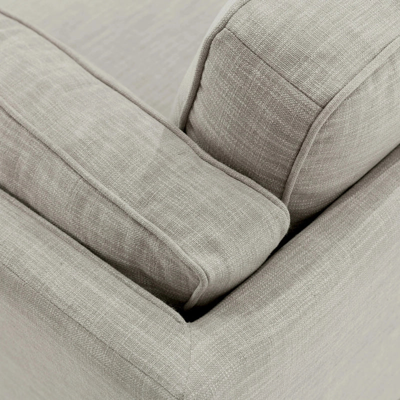 extending along the bottom and supported by sleek, tapered wooden legs