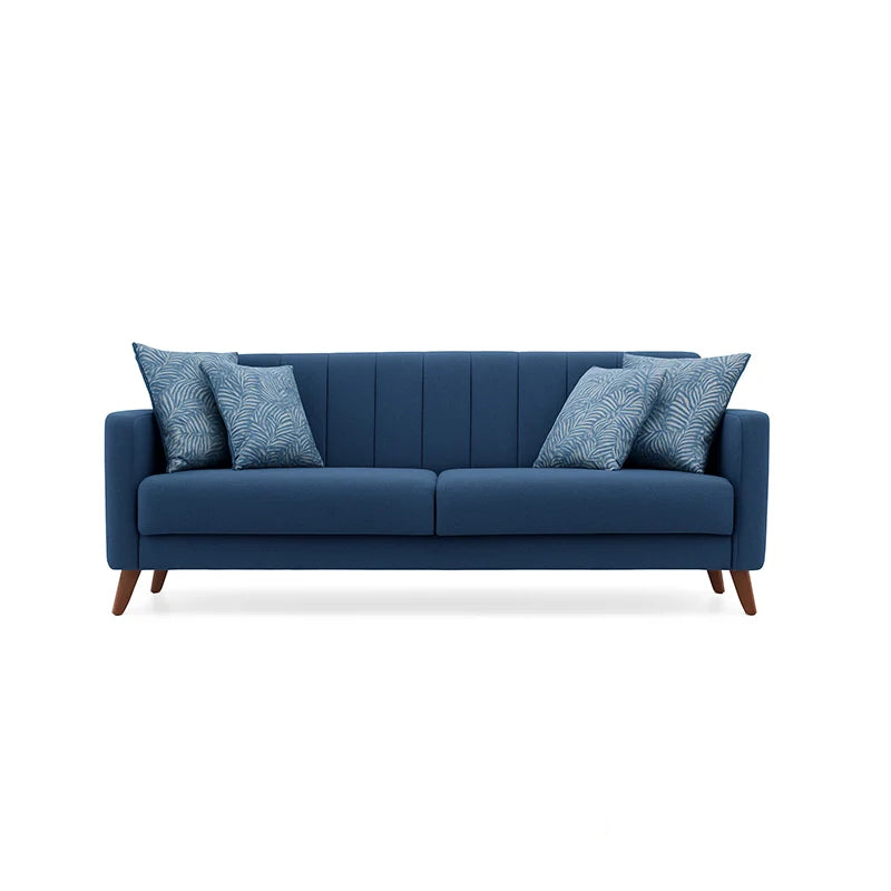 Blue sofa with patterned cushions on a white background
