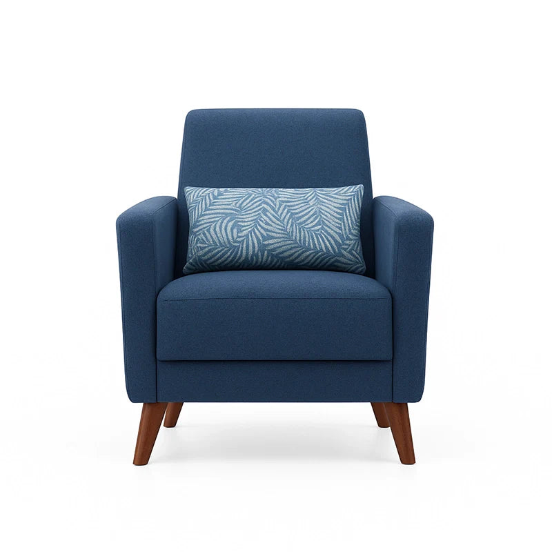 Blue armchair with a patterned pillow on a white background