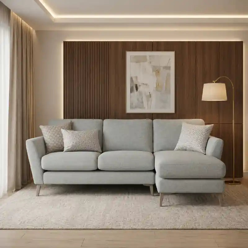 Upholstered in durable grey cloth, this fabric couch is supported by a termite-resistant Neem wood