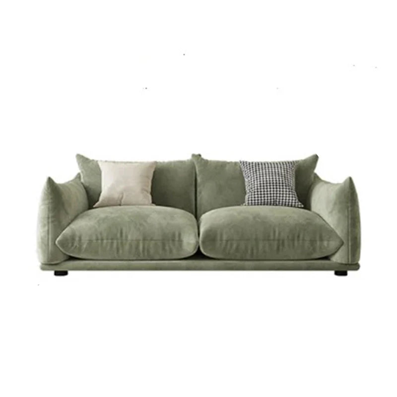 The raised metal legs and slim gold accents give this sofa set a light, contemporary presence, while the plush cushions support relaxed everyday seating.