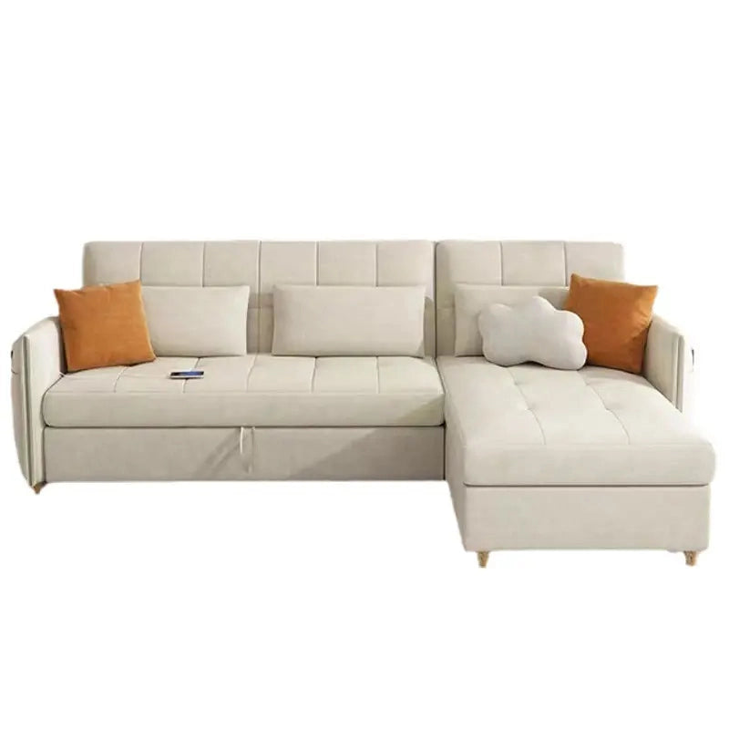 The L-shaped layout offers generous seating during the day and converts smoothly into a spacious bed at night, making it suitable for daily use and occasional guests.