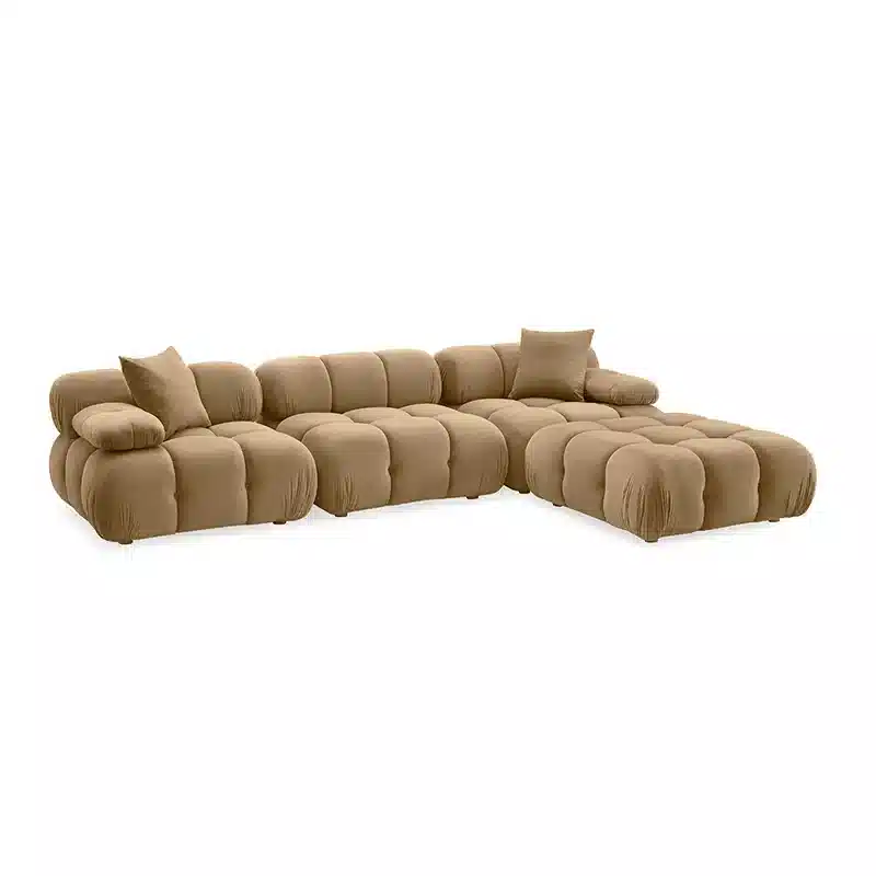 This Raelis couch is a sculptural 5 seater with a modular L-shape configuration, tailored for modern Indian living rooms. 