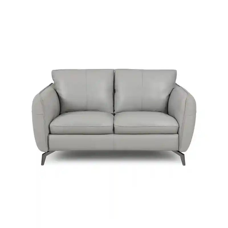 This lcouch combines clean geometry and plush seating into one refined furniture set for urban homes.