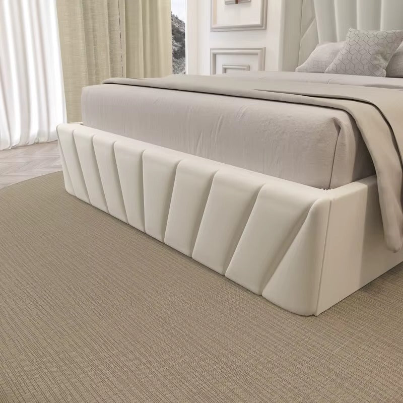 upholstered bed introduces a refined balance of comfort and contemporary
