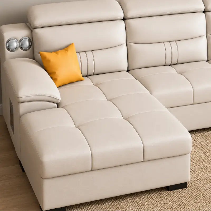 modern L-shaped form. This convertible sofa bed works well as a couch sleeper, offering a smooth