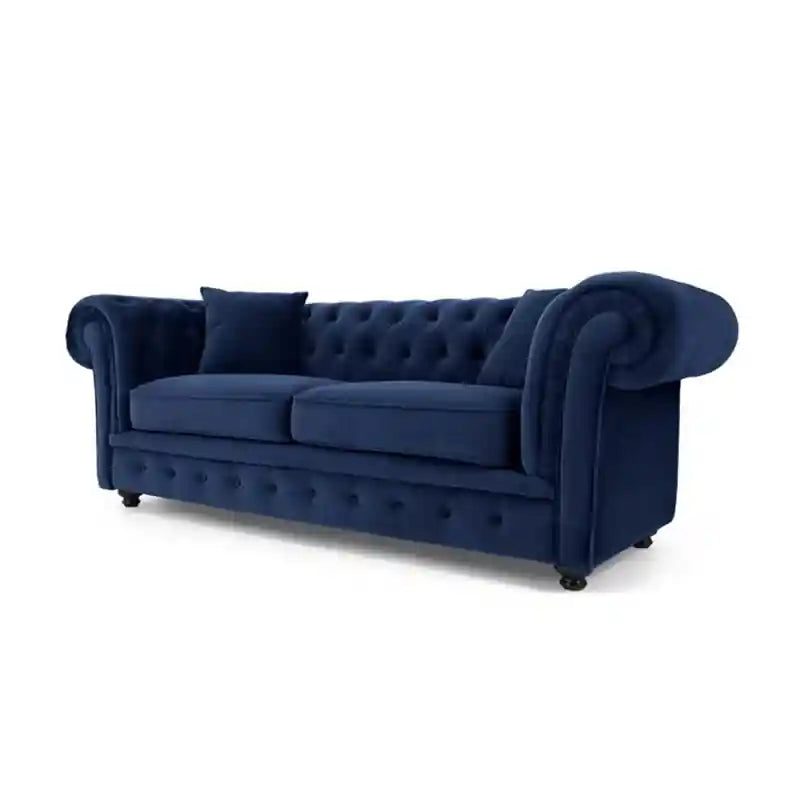 Crafted as a 3 seater couch, it features deep button tufting across the backrest and front base, rolled arms, and a linear silhouette that fits beautifully in formal lounges or modern Indian living rooms.