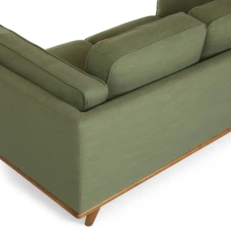 Built as a fabric sofa with a sturdy wooden base