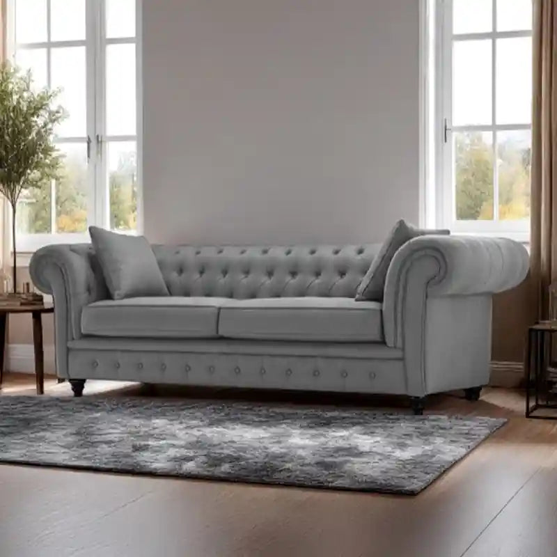 The turned wooden legs lend a grounded feel, enhancing its settee-like proportions.